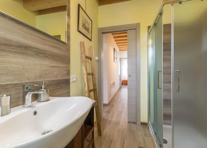 Апартаменты La Casa Nel Bosco Доло